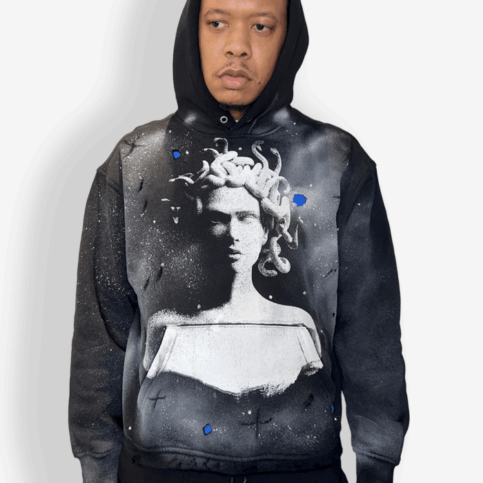 “Hand-finished Medusa hoodie inspired by Isaiah 54:17” “Limited edition faith-based streetwear hoodie” “Hand-distressed luxury hoodie with fabric infusion detail”